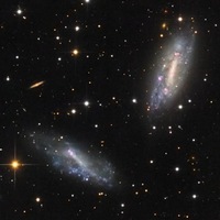 Пара взаимодействующих галактик NGC672 и IC1727 в созвездии Треугольник